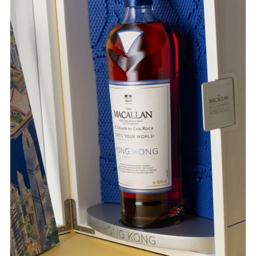 Macallan whisky bottle in a display case with &