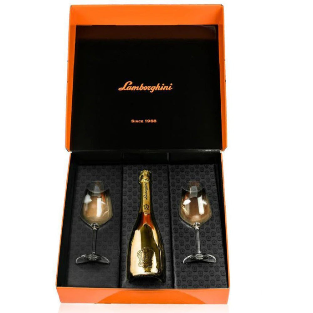 Lamborghini-branded champagne bottle and two glasses set in an orange and black box.